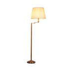 Lampadaire moderne à bras articulé en laiton avec abat-jour cylindrique en tissu